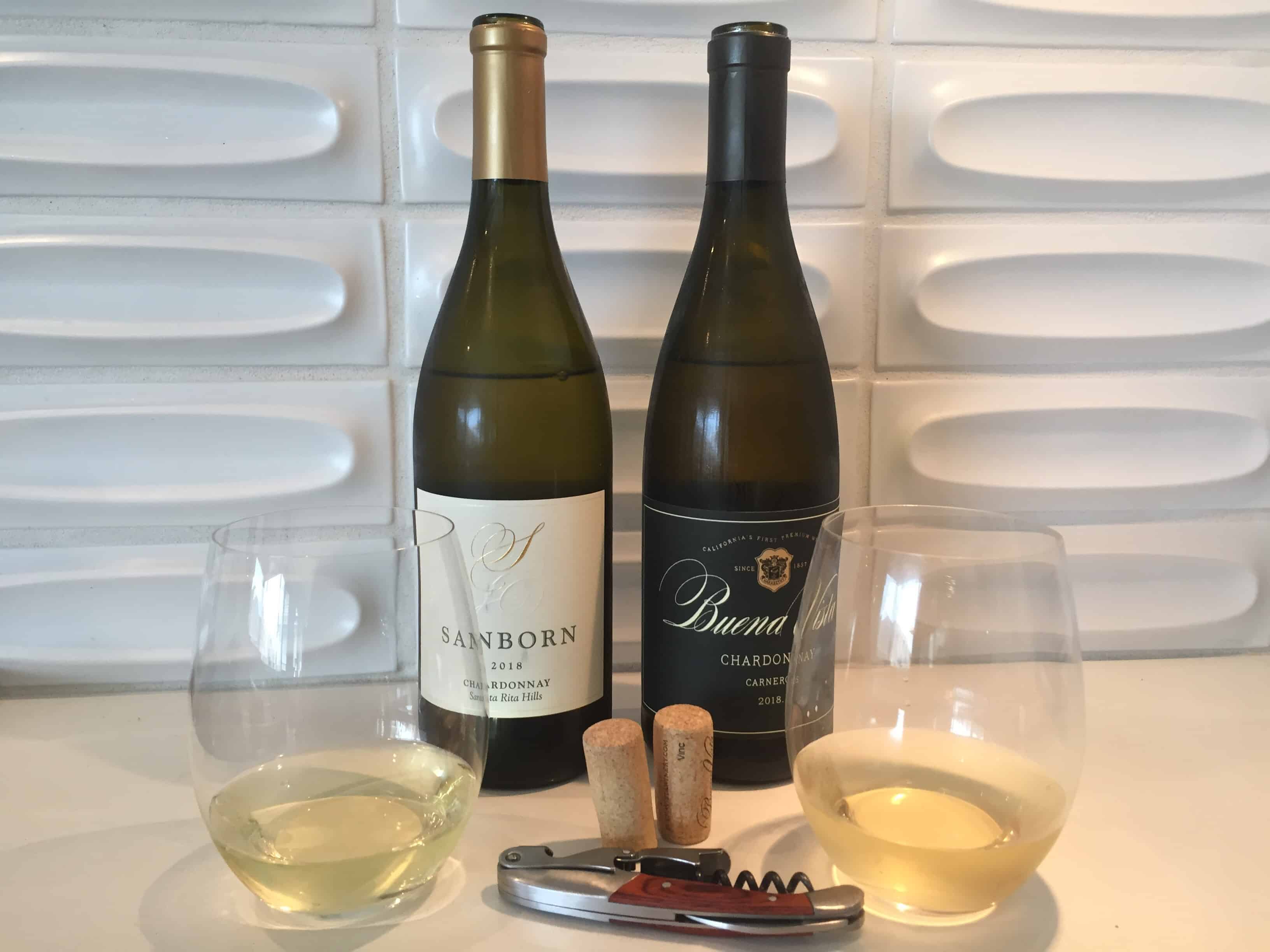 Bottles and glasses of Sanborn and Buena Vista Chardonnays from Traders Joe's