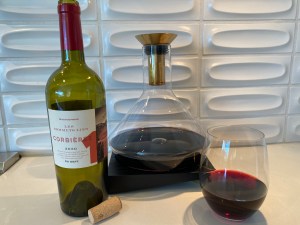 Bottle and glass of the 2020 Les Sommets Liès Corbières, France from Trader Joe's