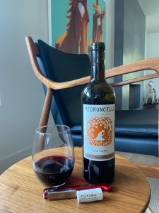 Bottle and glass of the 2021  Pedroncelli Mother Clone Zinfandel, Dry Creek Valley, Sonoma California