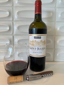 Bottle and glass of 2021 Kirkland Signature Saint-Julien, Bordeaux, France