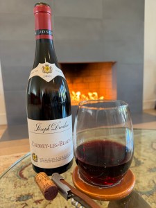 Bottle and glass of the 2021 Joseph Drouhin, Chorey-les-Beaune Pinot Noir