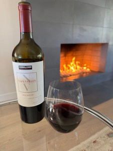 Bottle and glass of 2022 Kirkland Signature Red Blend, Napa Valley