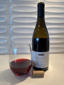 Bottle and glass of the 2022 Kirkland Signature Pinot Noir,  Willamette Valley, Oregon
