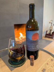 Bottle and glas of 2020 Requiem Syrah/Merlot