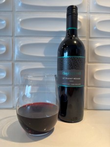 Bottle and glass of 2021 Elephant Hill Le Phant Rouge red blend from Costco